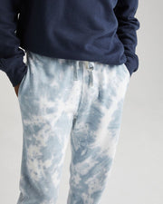 Comfortable, Classic Fit Sweatpant with Side Seam Pockets and Back Patch Pocket. Made from 60% Cotton, 40% Recycled Polyester. The Blue Mirage Tie Dye uses a nature inspired hand-dyed process which makes each piece slightly different and unique, Richer Poorer, $72