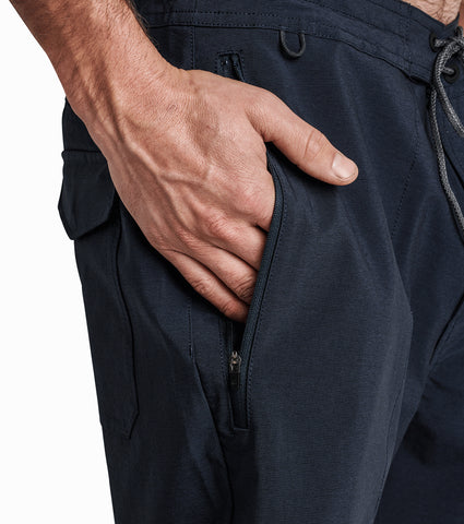 18" Outseam, 4-Way Stretch Travel Short in Quick Drying Durable Fabric. The updated style features a self-stowing back pocket for tight packing. Features a drawstring closure waist band and zipper fly., Roark, $78.00