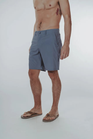 Hybrid Short with Hidden Coil Zipper Pockets and Extra Drawstring. The perfect shorts to go from tee time to the pool. 9" Inseam. The Normal Brand, $78.00